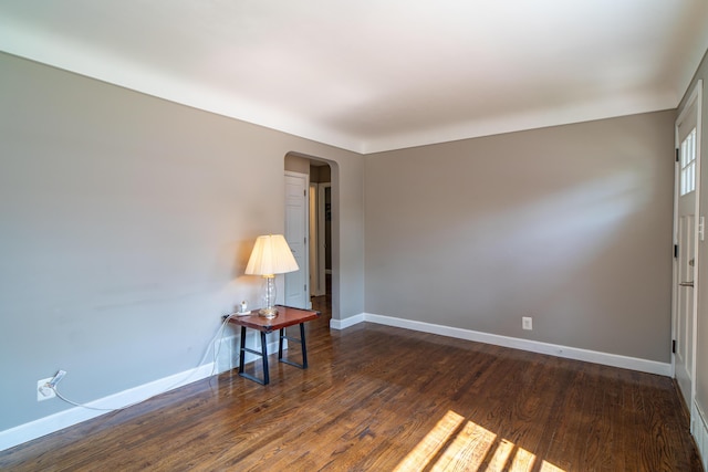 4211 Oakshire Ave, Berkley, MI 48072 - unfurnished room with arched walkways and wood finished floors