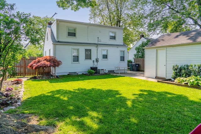 4211 Oakshire Ave, Berkley, MI 48072 - back of property with a chimney, a patio, and an outdoor structure