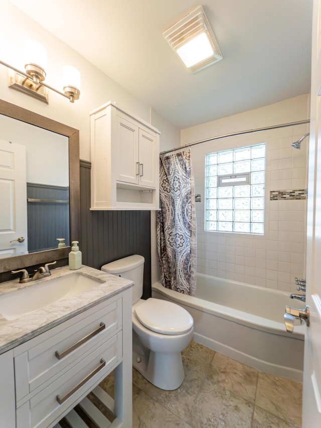 4211 Oakshire Ave, Berkley, MI 48072 - full bath with vanity, shower / tub combo, a wainscoted wall, and tile patterned floors