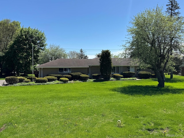 28670 Inkster Rd, Southfield, MI 48034 - single story home featuring a front yard and a garage
