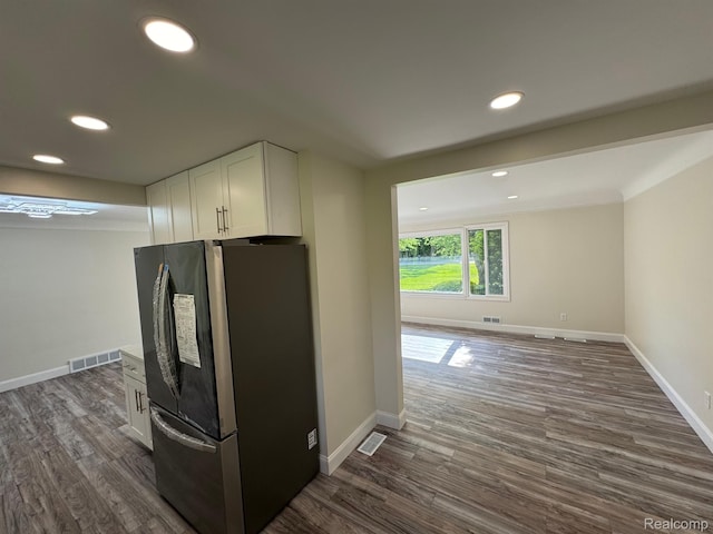 28670 Inkster Rd, Southfield, MI 48034 - kitchen featuring freestanding refrigerator, white cabinetry, dark wood-style flooring, and recessed lighting