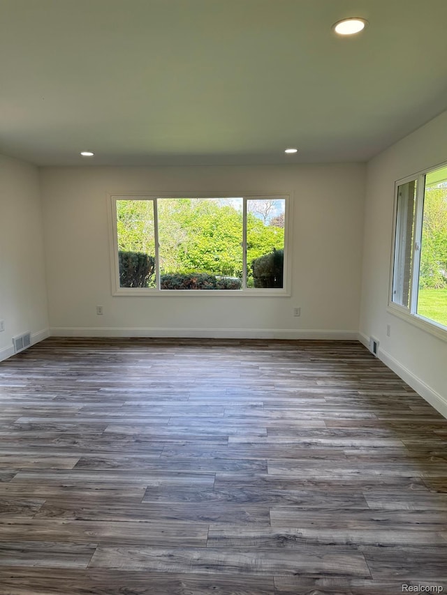 28670 Inkster Rd, Southfield, MI 48034 - empty room with wood finished floors and recessed lighting
