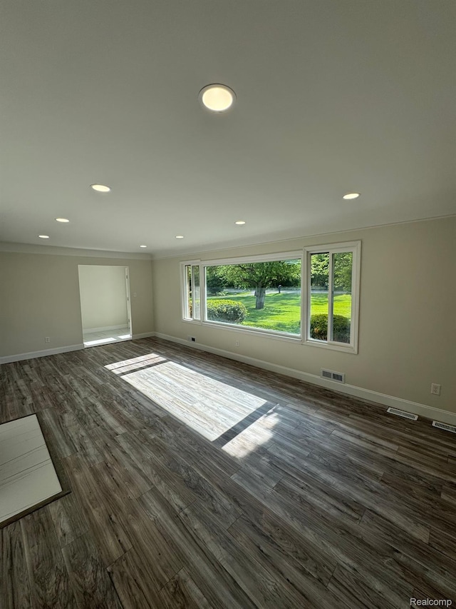 28670 Inkster Rd, Southfield, MI 48034 - unfurnished living room featuring dark wood-style flooring, recessed lighting, and crown molding