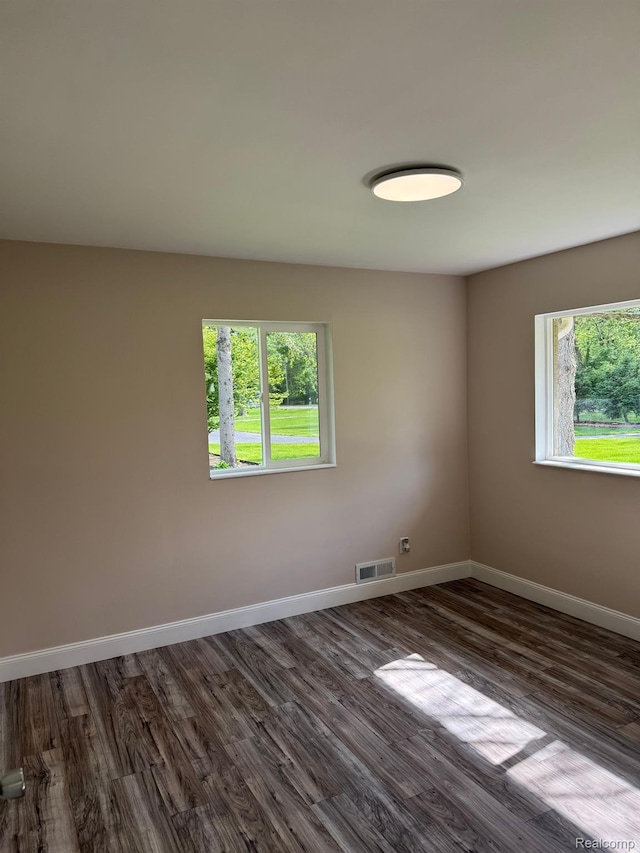 28670 Inkster Rd, Southfield, MI 48034 - unfurnished room with dark wood-style floors and baseboards