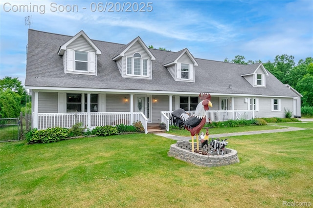 8420 Beers Rd, Swartz Creek, MI 48473 - cape cod-style house featuring covered porch and a shingled roof