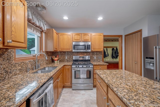 8420 Beers Rd, Swartz Creek, MI 48473 - kitchen featuring appliances with stainless steel finishes, dark stone counters, decorative backsplash, and recessed lighting