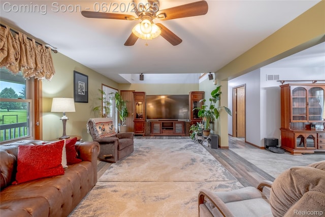 8420 Beers Rd, Swartz Creek, MI 48473 - living room with a ceiling fan and wood finished floors