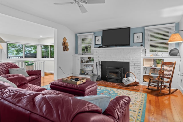 3184 N Lakeshore Dr, Hillsdale, MI 49242 - living room featuring ceiling fan, wood finished floors, and vaulted ceiling