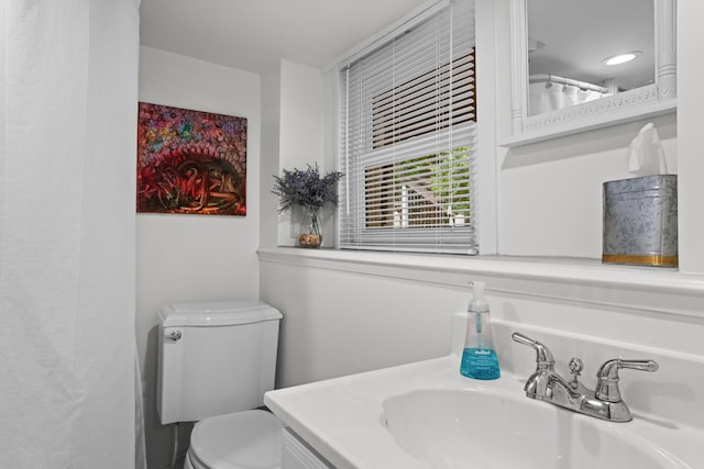 3184 N Lakeshore Dr, Hillsdale, MI 49242 - bathroom featuring toilet and vanity
