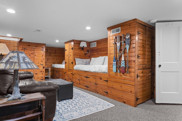 3184 N Lakeshore Dr, Hillsdale, MI 49242 - carpeted bedroom with wooden walls and recessed lighting