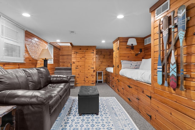 3184 N Lakeshore Dr, Hillsdale, MI 49242 - bedroom featuring wood walls, carpet floors, and recessed lighting