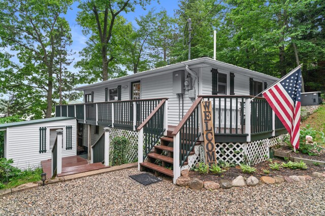3184 N Lakeshore Dr, Hillsdale, MI 49242 - view of front facade featuring a wooden deck