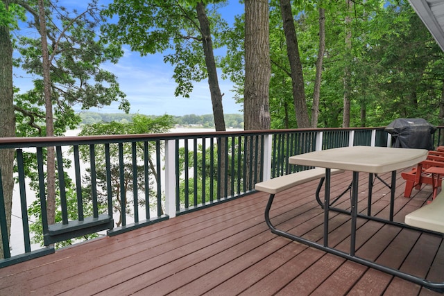 3184 N Lakeshore Dr, Hillsdale, MI 49242 - wooden terrace featuring grilling area and outdoor dining area