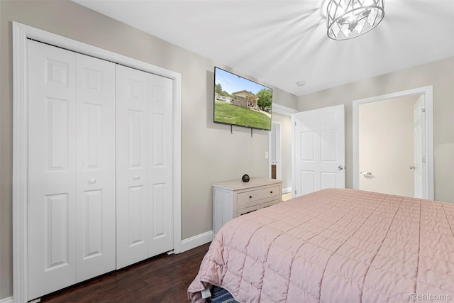 4981 Harding St, Dearborn Heights, MI 48125 - bedroom with dark wood-style floors and a closet