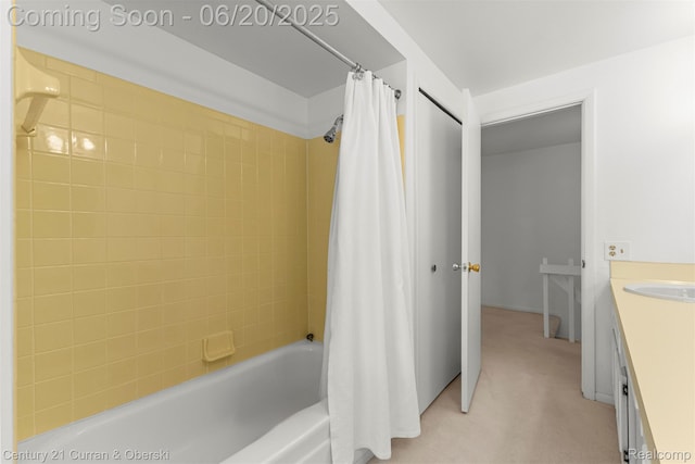 3150 Wellington Ct, West Bloomfield, MI 48324 - bathroom featuring shower / bath combo with shower curtain and vanity