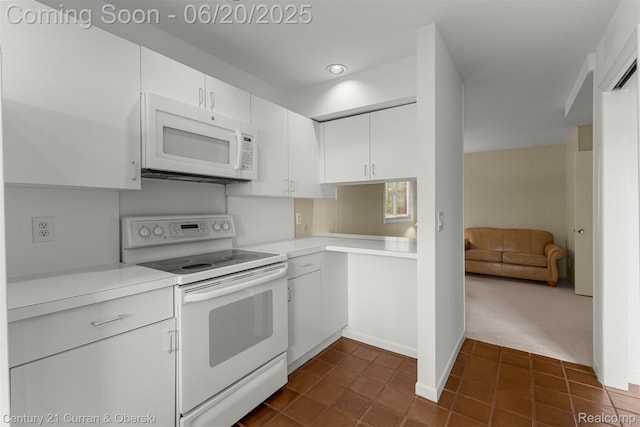 3150 Wellington Ct, West Bloomfield, MI 48324 - kitchen featuring white appliances, light countertops, white cabinets, dark carpet, and recessed lighting