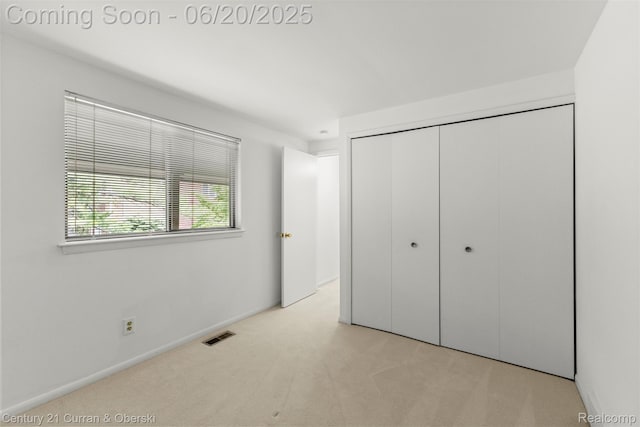 3150 Wellington Ct, West Bloomfield, MI 48324 - unfurnished bedroom featuring a closet and carpet