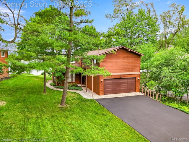 3150 Wellington Ct, West Bloomfield, MI 48324 - rustic home featuring an attached garage, asphalt driveway, and a front yard