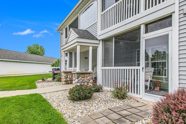 749 W Barrington Cir, Jackson, MI 49203 - property entrance featuring roof with shingles