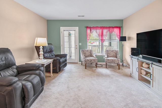 749 W Barrington Cir, Jackson, MI 49203 - living area featuring carpet flooring and baseboards