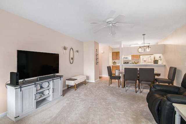 749 W Barrington Cir, Jackson, MI 49203 - living area featuring ceiling fan and light colored carpet
