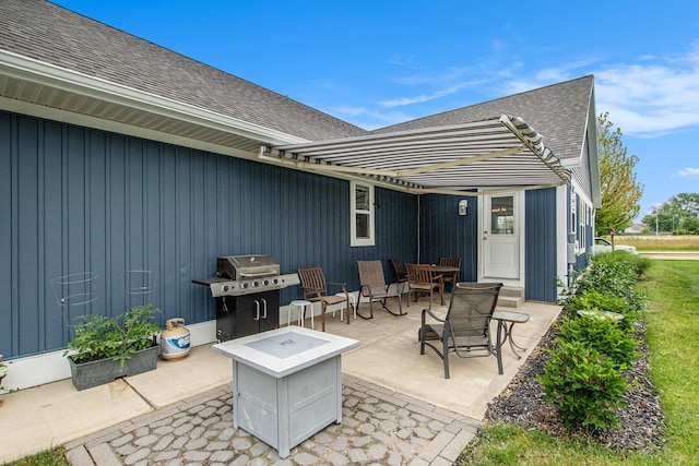964 Everett Pkwy, South Haven, MI 49090 - view of patio / terrace featuring outdoor dining space, a grill, and an outdoor fire pit