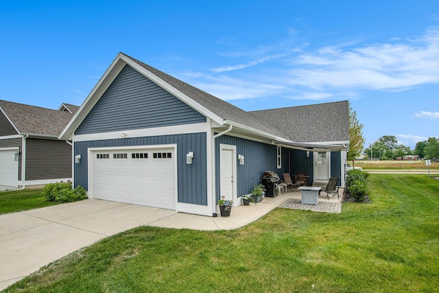 964 Everett Pkwy, South Haven, MI 49090 - view of front of home featuring an attached garage, a front yard, and driveway