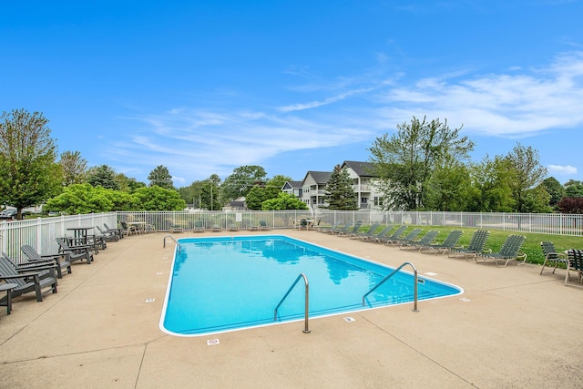 964 Everett Pkwy, South Haven, MI 49090 - community pool with a patio area and view of wooded area