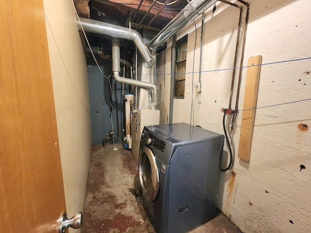 254 Holly St SW, Grand Rapids, MI 49548 - utility room with washer / dryer and water heater