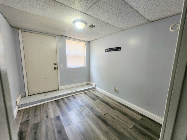 254 Holly St SW, Grand Rapids, MI 49548 - foyer entrance featuring a paneled ceiling and wood finished floors