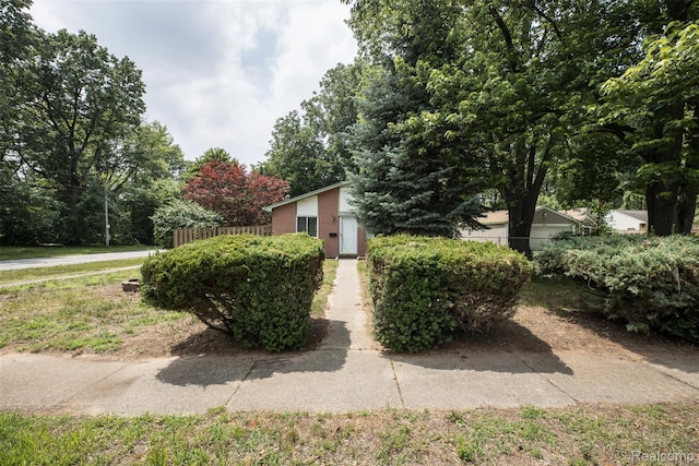 6580 Troy St, Southgate, MI 48180 - view of home's exterior featuring brick siding
