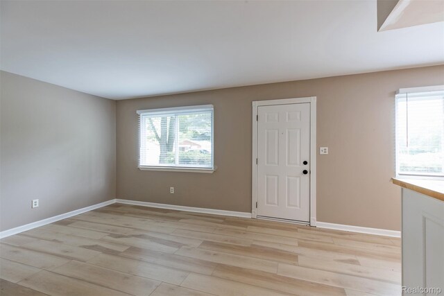 6580 Troy St, Southgate, MI 48180 - entryway with light wood finished floors and baseboards