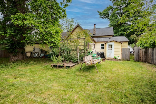 412 E Jefferson St, Hart, MI 49420 - rear view of house with a wooden deck
