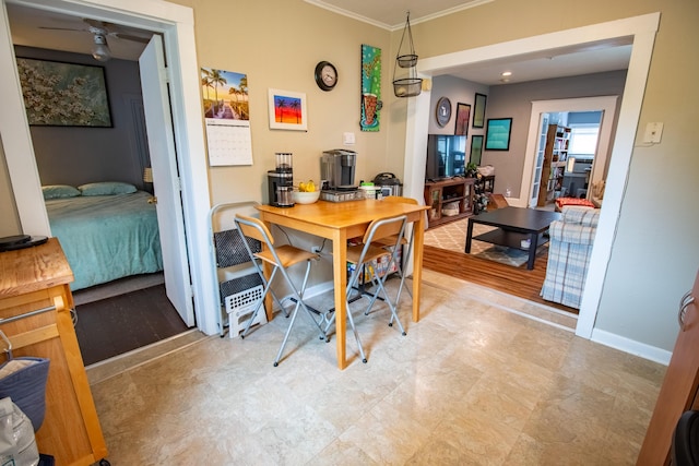412 E Jefferson St, Hart, MI 49420 - dining area featuring crown molding and baseboards