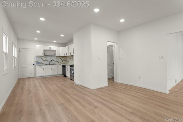 7432 Churchill St, Detroit, MI 48206 - unfurnished living room with recessed lighting and light wood finished floors