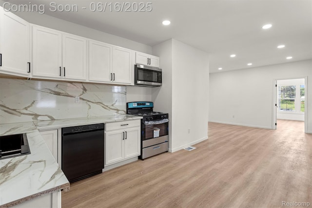 7432 Churchill St, Detroit, MI 48206 - kitchen with appliances with stainless steel finishes, recessed lighting, white cabinets, light wood-style flooring, and backsplash
