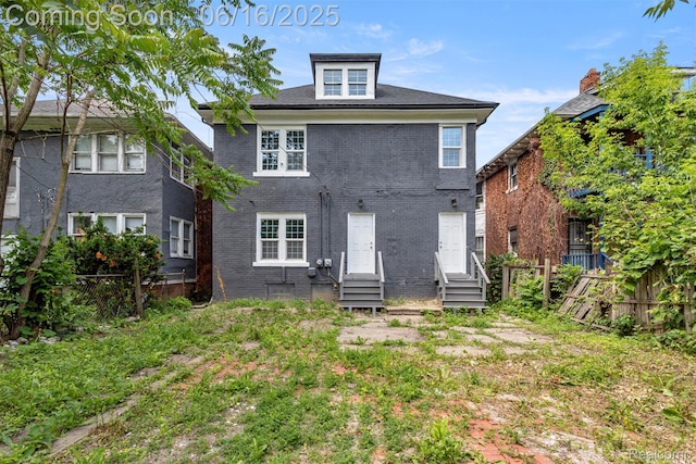 7432 Churchill St, Detroit, MI 48206 - rear view of property with entry steps and brick siding