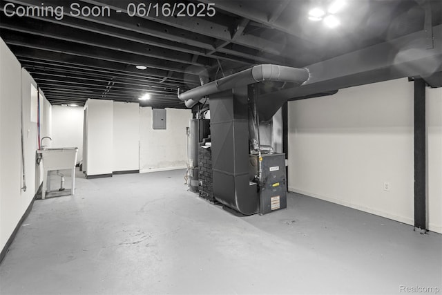 7432 Churchill St, Detroit, MI 48206 - finished below grade area featuring electric panel, gas water heater, and heating unit