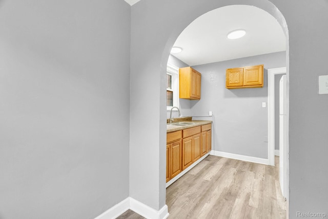 17196 Murray Hill St, Detroit, MI 48235 - bar area with light wood-type flooring and arched walkways