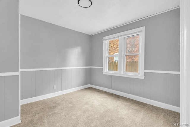 17196 Murray Hill St, Detroit, MI 48235 - carpeted empty room featuring a wainscoted wall