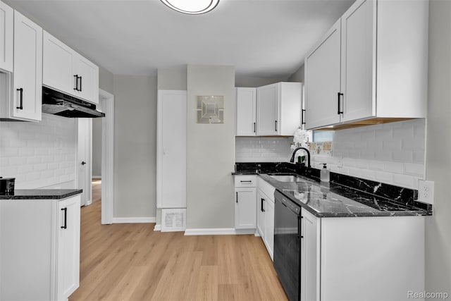 3112 Bailey Ave, Lincoln Park, MI 48146 - kitchen with dishwasher, light wood finished floors, under cabinet range hood, dark stone countertops, and white cabinetry
