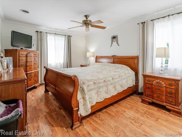 871 Vanderpool Dr, Troy, MI 48083 - bedroom with crown molding, light wood-style flooring, and ceiling fan