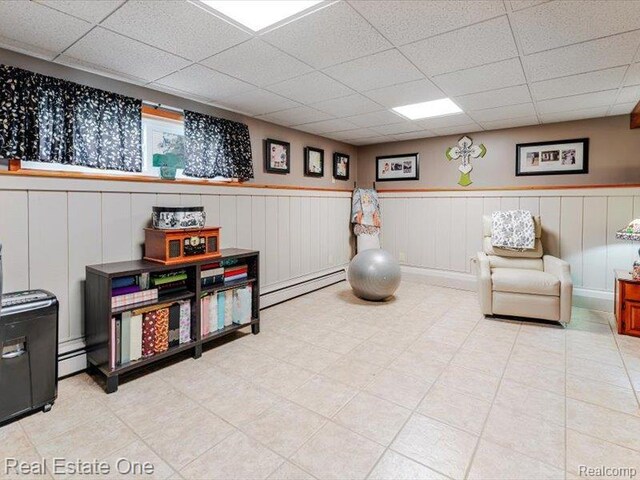 871 Vanderpool Dr, Troy, MI 48083 - interior space featuring a drop ceiling, a baseboard radiator, and wainscoting