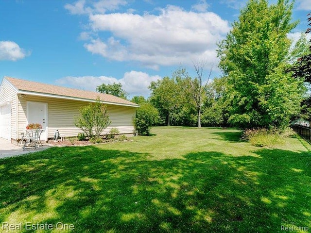 871 Vanderpool Dr, Troy, MI 48083 - view of yard with a garage