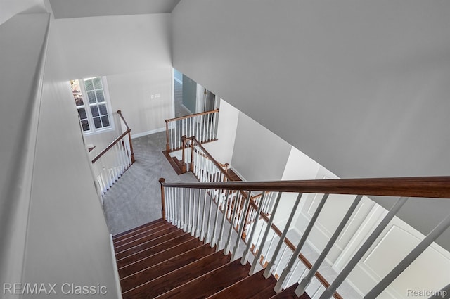 24825 Reeds Pointe Dr, Novi, MI 48374 - stairway featuring baseboards and carpet flooring