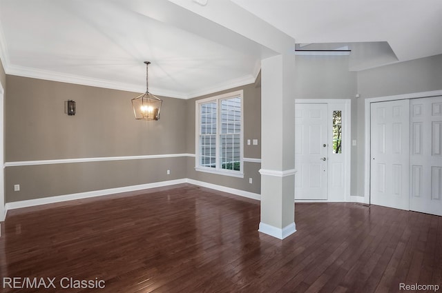 24825 Reeds Pointe Dr, Novi, MI 48374 - entryway with dark wood finished floors, a chandelier, and crown molding