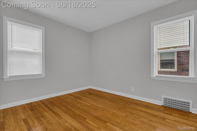 19505 Santa Barbara Dr, Detroit, MI 48221 - unfurnished room with wood finished floors and healthy amount of natural light