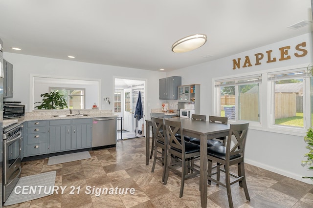 2942 Harrison St, Saginaw, MI 48604 - dining area featuring plenty of natural light and stone finish floors