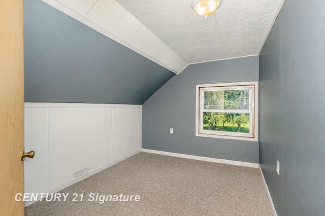 2942 Harrison St, Saginaw, MI 48604 - additional living space with lofted ceiling and carpet floors