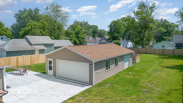 2942 Harrison St, Saginaw, MI 48604 - view of front of home with a shingled roof, a garage, a patio, and a residential view